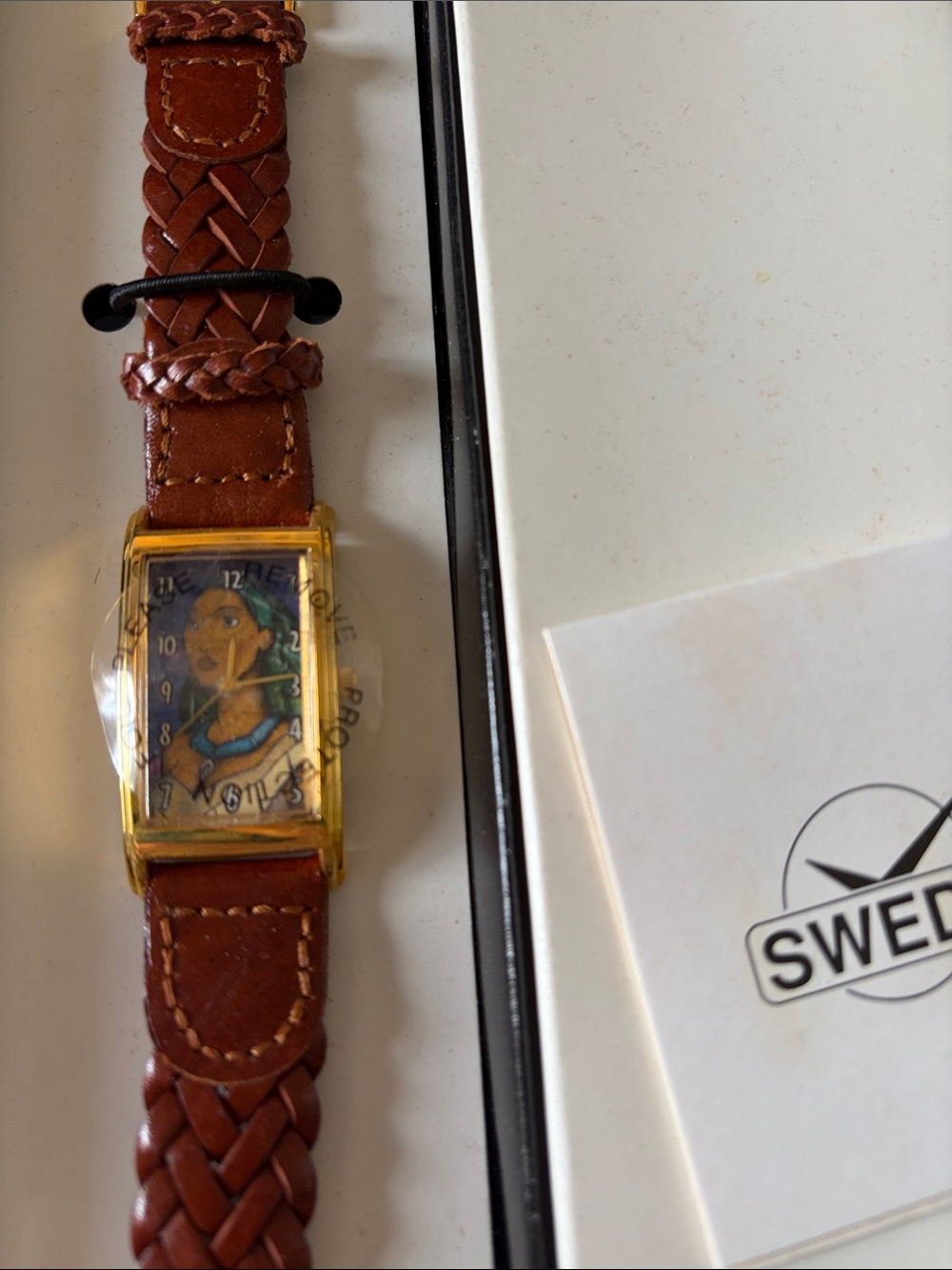 Sweda Disney Pocahontas watch. vintage.  brown braided band.  new